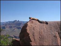 Zack relaxing on rock on S Kaibab trail