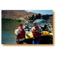 Picture of Jennifer and me in life vests. Scotty Stevens packs his boat.
