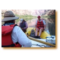 Picture of Bill rowing Scotty's boat in calm water the first day.